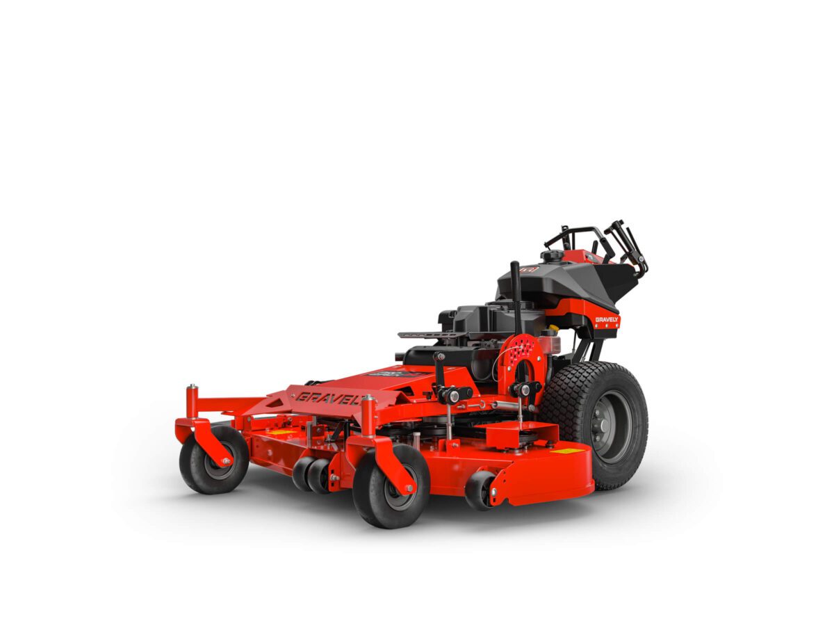 A red commercial lawn mower with large rear tires and smaller front wheels, featuring a black ergonomic handlebar and a visible engine.