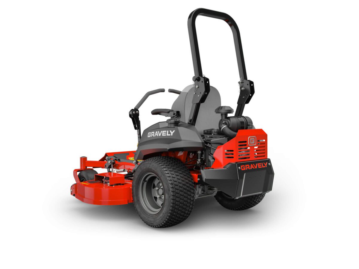 A red and gray Gravely lawn mower with large rear wheels and a roll bar, viewed from the rear side angle on a white background.