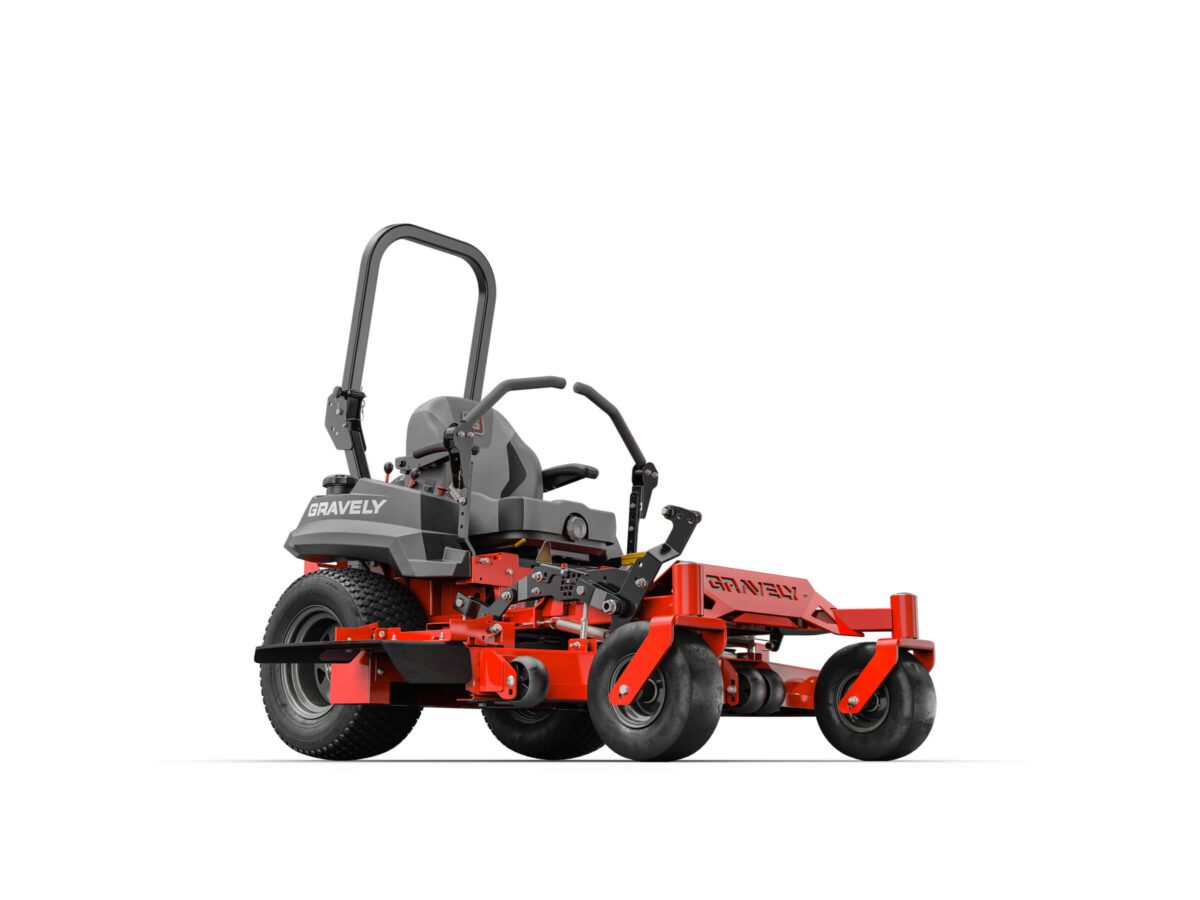 Red and black zero-turn lawn mower with visible brand name, featuring a seat, steering levers, and large wheels.