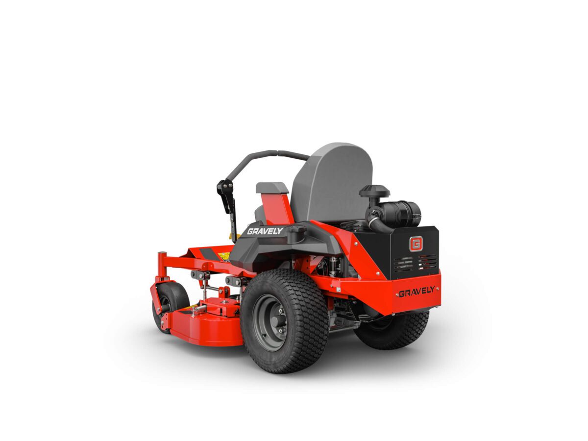 A red and black riding lawn mower with large rear wheels and a steering handle.