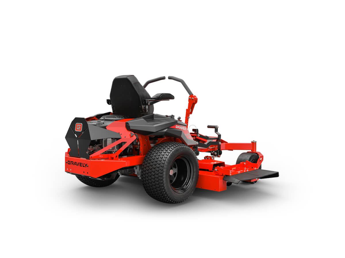 A red and black riding lawn mower with large rear wheels, a seat with armrests, and control levers.