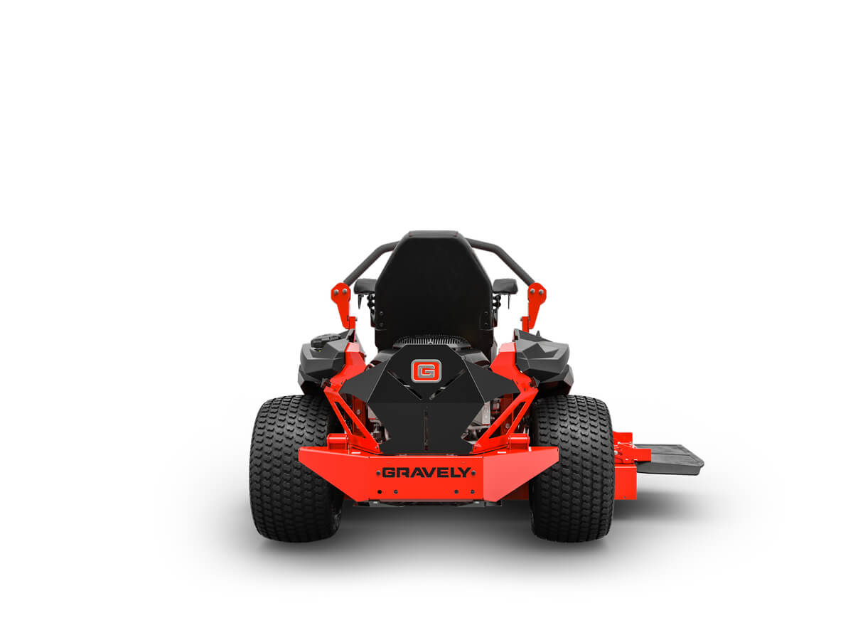 Red and black zero-turn lawn mower, front view, displaying large rear tires, step for mounting, and visible brand logo.