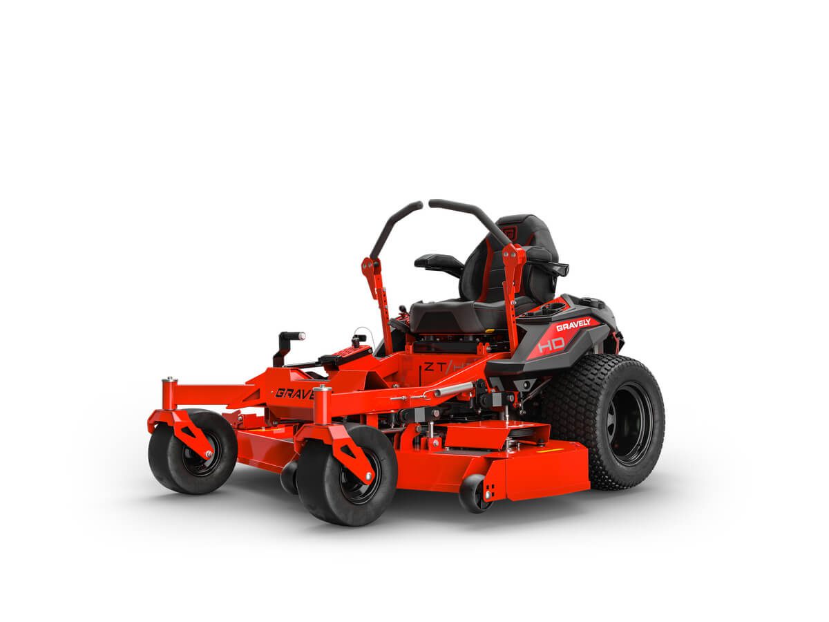 Red zero-turn riding lawn mower with a black seat, large rear wheels, and smaller front wheels, designed for grass cutting and lawn maintenance.