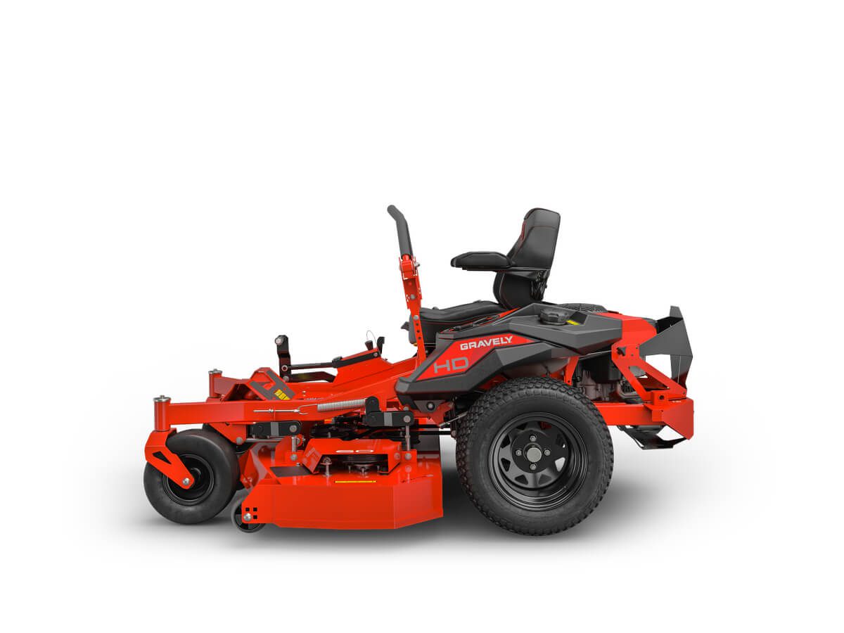A red zero-turn lawn mower with a black seat and controls, featuring sturdy wheels and a robust frame.
