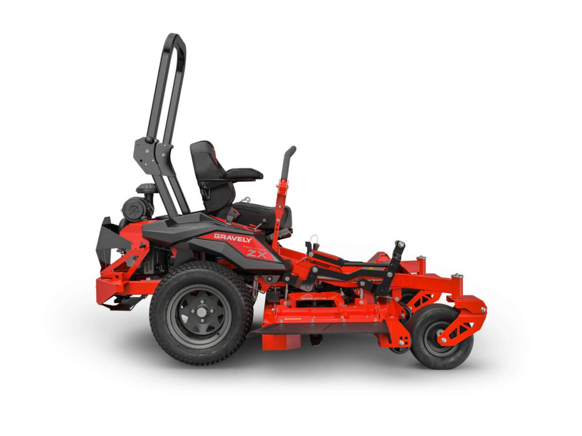 Red ride-on lawn mower with black seat, roll bar, and visible levers on the sides. It features a Gravely logo and ZX3 model marking on the side.