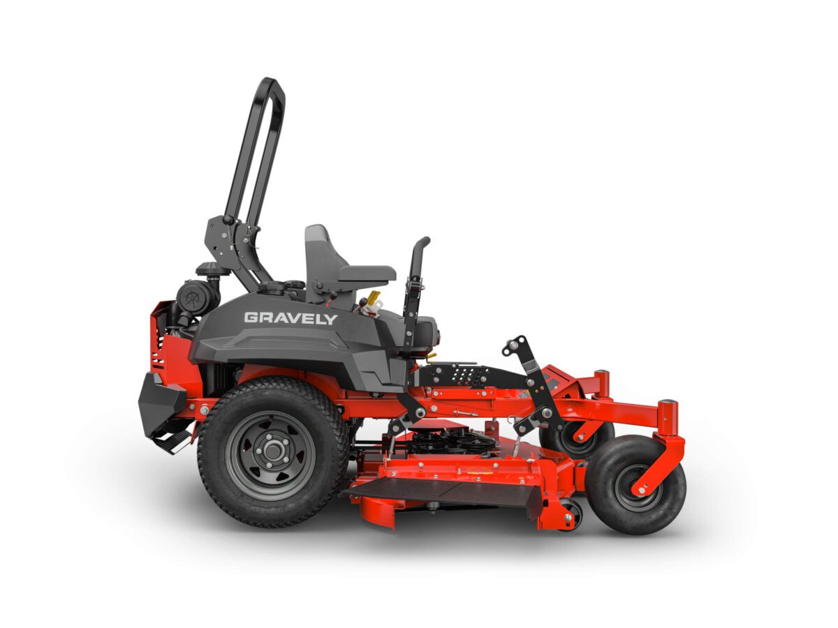 Red and gray zero-turn lawn mower with a roll bar, labeled "Gravely," featuring a seat, steering levers, and large rear wheels.