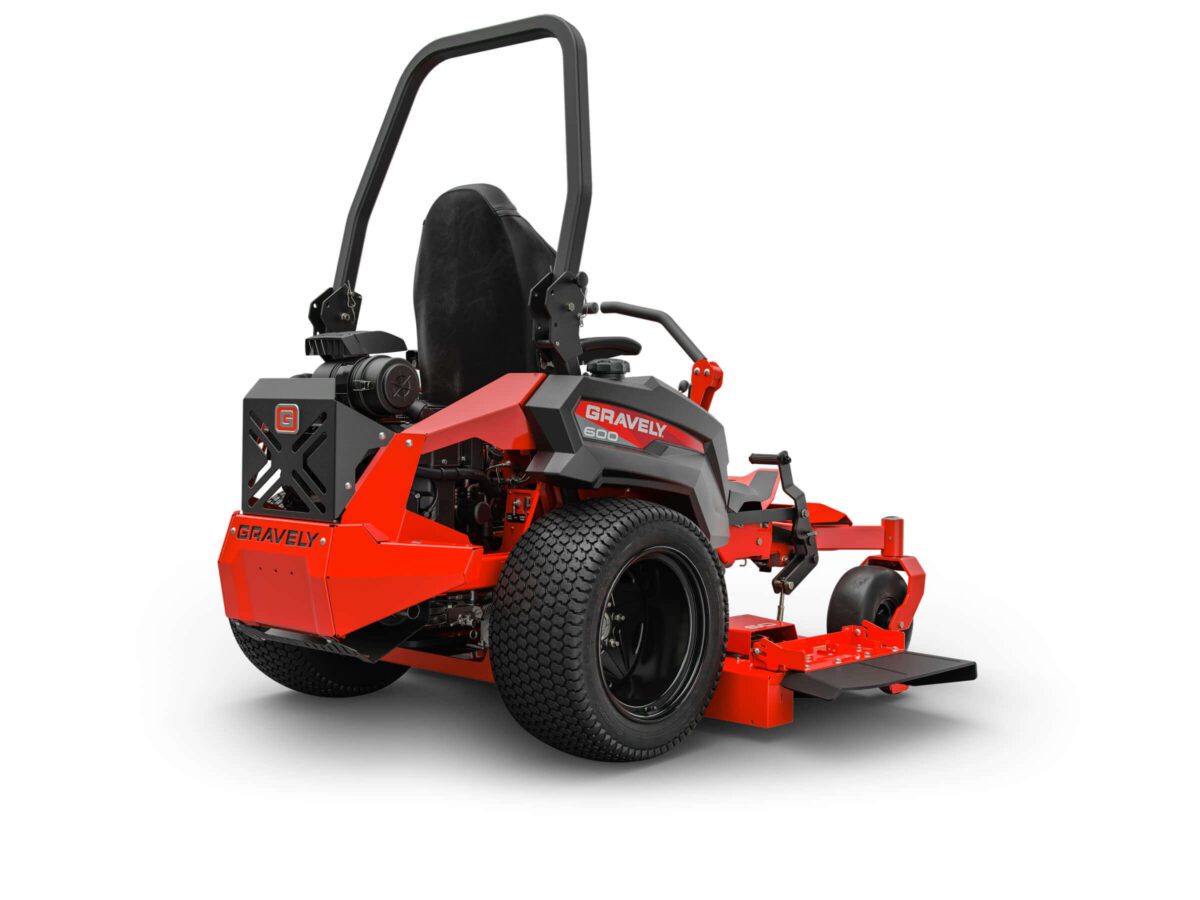 A red and black Gravely zero-turn lawn mower with prominent rear wheels and a raised seat, viewed from the rear left angle.