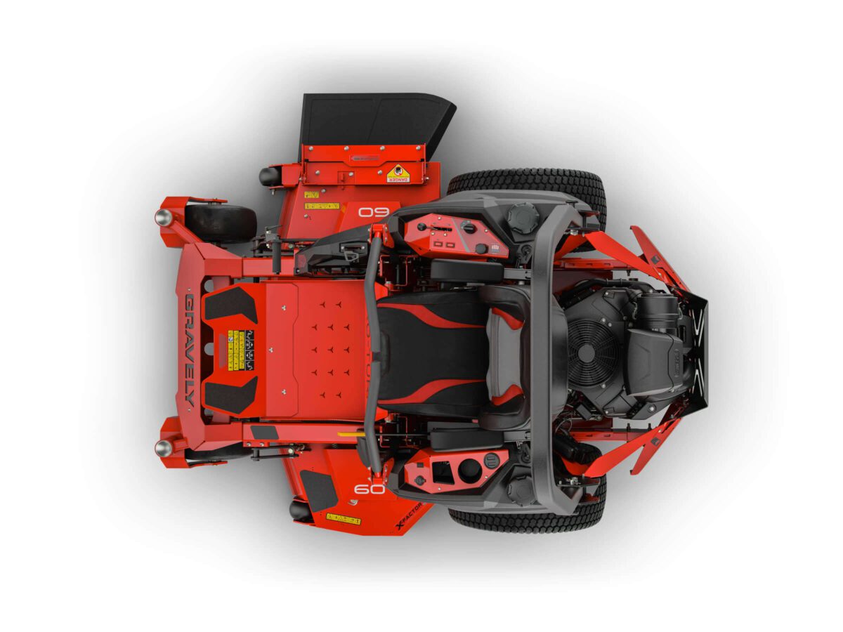 A top view of a red heavy-duty lawn mower showcases its robust engine, comfortable seat, and intuitive control panel, ideal for professional outdoor landscaping.