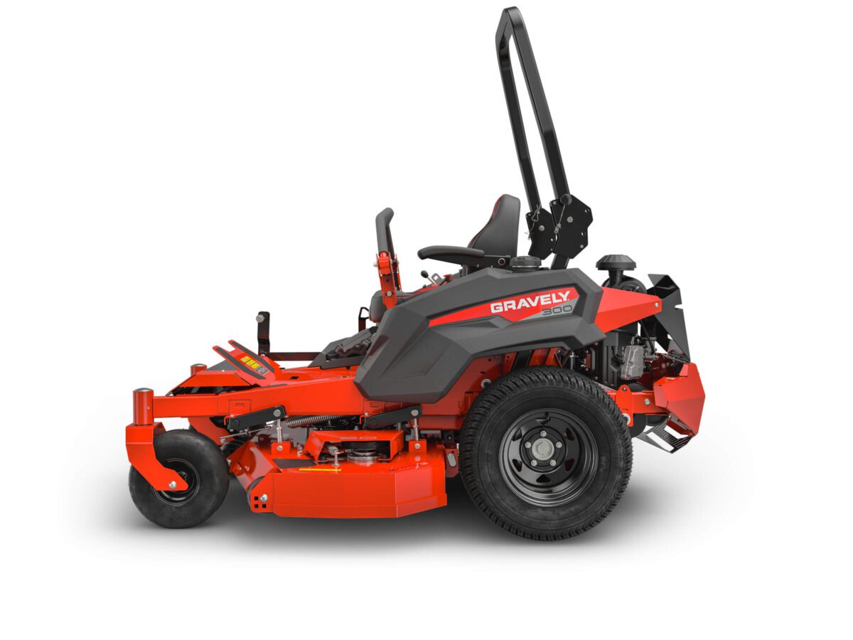 A red Gravely zero-turn lawn mower with a roll-over protection system, side view.