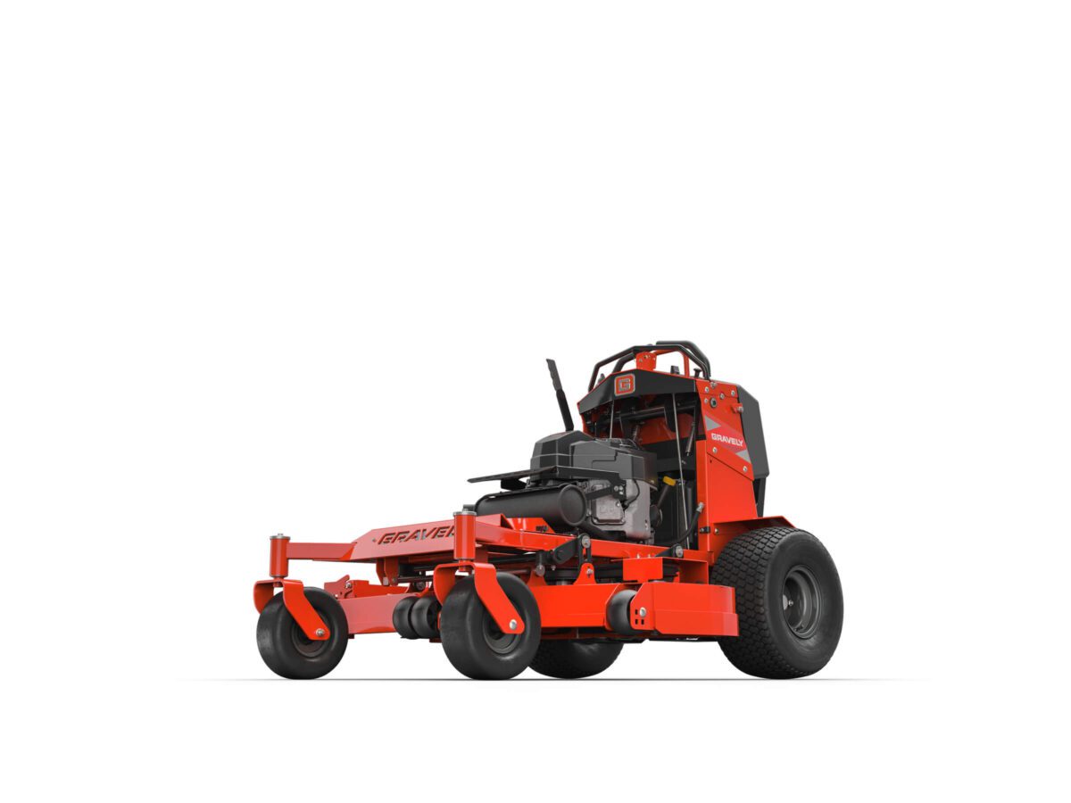 A red commercial lawn mower with a front deck and wide rear tires designed for efficient grass cutting.