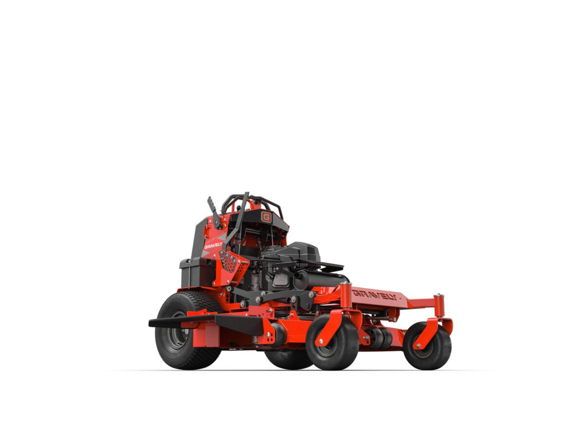 Red stand-on lawn mower with black seat and controls, featuring large rear wheels and smaller front caster wheels.