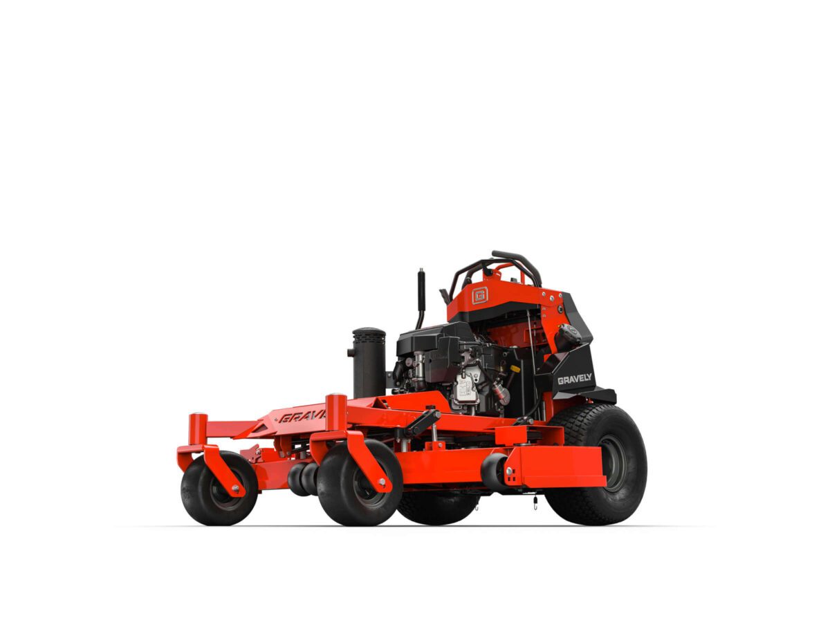 Orange commercial lawn mower with black seat and controls, featuring large front wheels and an exposed engine on a white background.