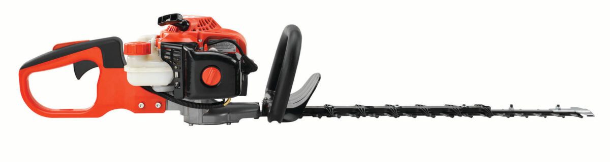 A red and black gas-powered hedge trimmer with a long cutting blade and ergonomic handle on a white background.