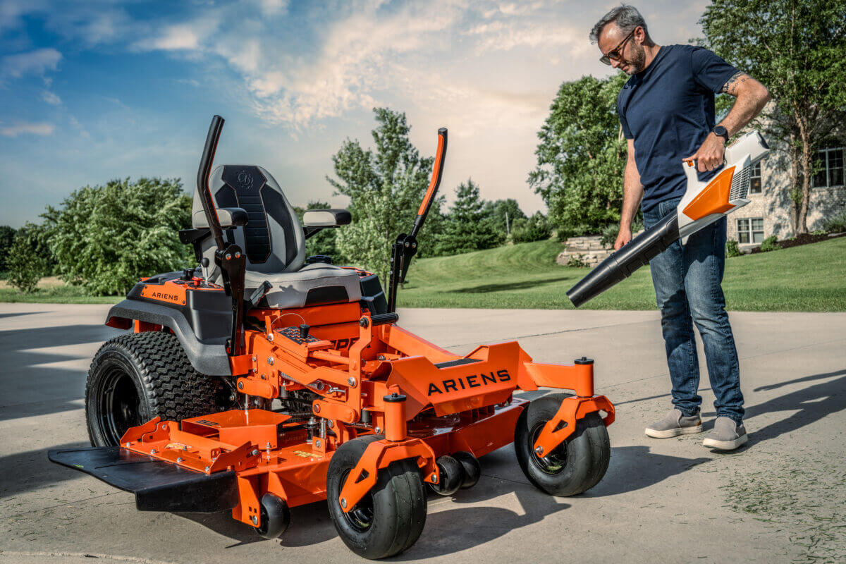 apex mower on the side walk