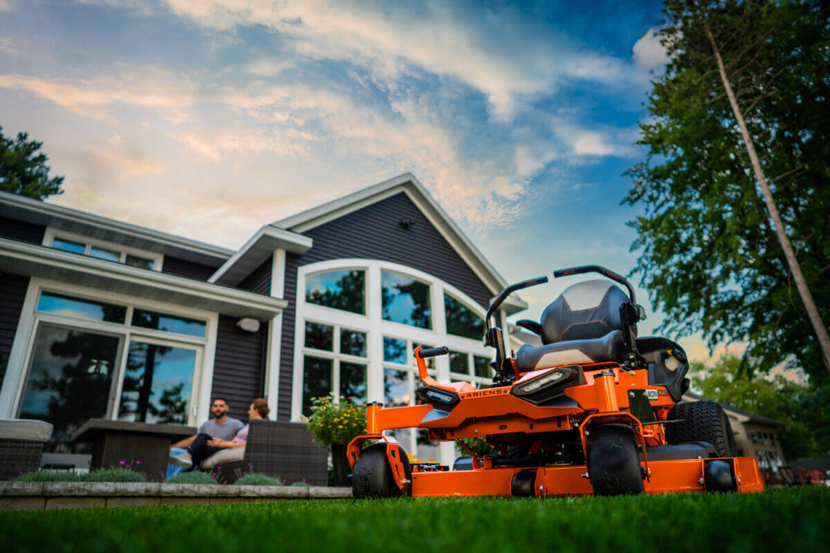 ikon mower in front of a house