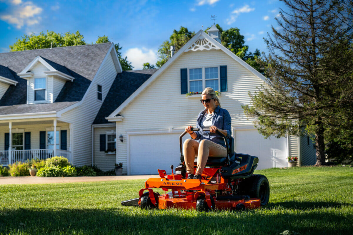 woman on a edge series lawn mower